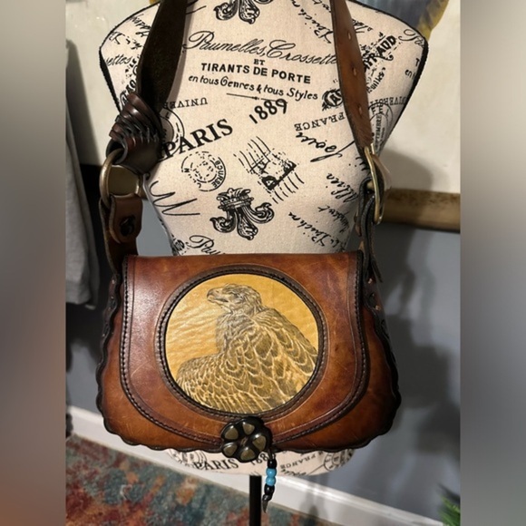 Dooney & Bourke Handbags - One of a kind hand tooled leather bag with eagle and brass hardware